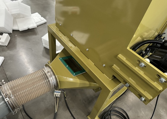 boca de alimentación de la máquina